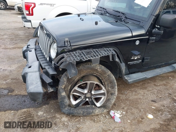 2016 Jeep Wrangler Unlimited 75th Anniversary with VIN 1C4BJWEG1GL221873, listed as a IAAI auction lot 41635788 with 148,493 mi miles. Bid and sale history available at carsss.com. Image 6.