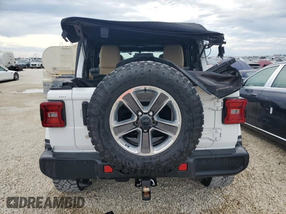 2018 Jeep Wrangler Unlimited Sahara with VIN 1C4HJXEG4JW149315, listed as a Copart auction lot 77314714 with Not provided miles and Salvage title. Bid and sale history available at DreamBid. Image 6.
