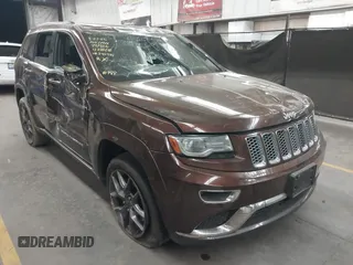 2014 Jeep Grand Cherokee Summit with VIN 1C4RJFJT6EC346575, listed as a IAAI auction lot 41881795 with 148,941 mi miles and . Bid and sale history available at DreamBid. Image 1.
