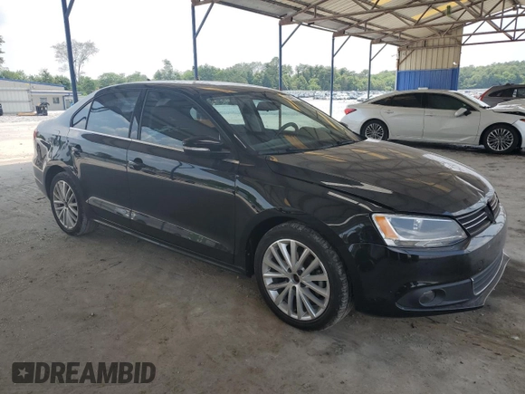 2012 Volkswagen Jetta SEL with VIN 3VWLX7AJ2CM409477, listed as a Copart auction lot 59476915 with 156,035 mi miles and Salvage title. Bid and sale history available at DreamBid. Image 4.