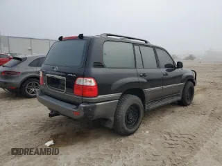 2001 Lexus LX 470 z VIN JTJHT00W513509447, wystawiony jako Copart lot #43988595 z przebiegiem 251 861 mil mil oraz Tytuł czysty. Historia ofert i sprzedaży dostępna na DreamBid. Obrazek 3.