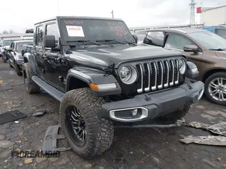 2022 Jeep Gladiator High Altitude with VIN 1C6HJTFG1NL164764, listed as a IAAI auction lot 41727357 with 28,222 mi miles and . Bid and sale history available at DreamBid. Image 1.
