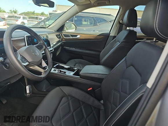 2024 Volkswagen Atlas SE z VIN 1V2HR2CA4RC558128, wystawiony jako IAAI lot #42852874 z przebiegiem 23 623 mil mil oraz . Historia ofert i sprzedaży dostępna na DreamBid. Obrazek 16.