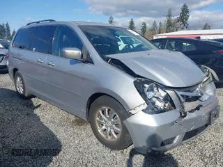 2010 Honda Odyssey EX-L with VIN 5FNRL3H62AB083068, listed as a IAAI auction lot 41950383 with 134,150 mi miles. Bid and sale history available at carsss.com. Image 1.