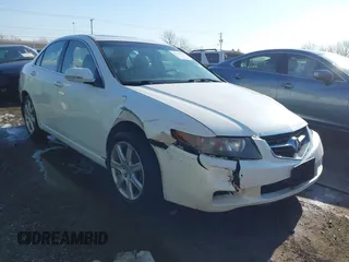 2004 Acura TSX w/Navigation with VIN JH4CL96954C035697, listed as a IAAI auction lot 41743954 with 233,696 mi miles. Bid and sale history available at carsss.com. Image 1.