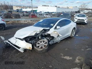 2021 Tesla Model S Long Range Plus with VIN 5YJSA1E20MF426400, listed as a IAAI auction lot 41453704 with Not provided miles and . Bid and sale history available at DreamBid. Image 2.