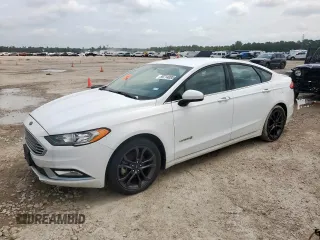 2018 Ford Fusion SE z VIN 3FA6P0LU0JR242010, wystawiony jako Copart lot #59714085 z przebiegiem 135 911 mil mil oraz Czysty tytuł • Clean title. Historia ofert i sprzedaży dostępna na DreamBid. Obrazek 1.