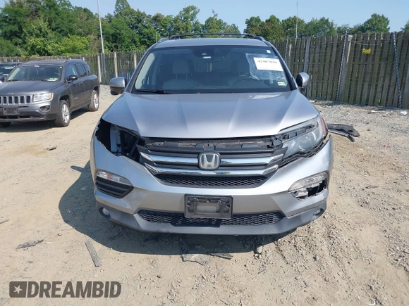2017 Honda Pilot EX-L z VIN 5FNYF6H69HB053323, wystawiony jako IAAI lot #42407040 z przebiegiem 120 280 mil mil oraz . Historia ofert i sprzedaży dostępna na DreamBid. Obrazek 18.