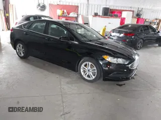 2018 Ford Fusion SE z VIN 3FA6P0HD4JR240866, wystawiony jako IAAI lot #41776551 z przebiegiem 80 341 mil mil oraz . Historia ofert i sprzedaży dostępna na DreamBid. Obrazek 1.
