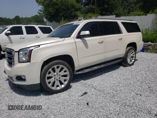2015 GMC Yukon XL SLT with VIN 1GKS1HKC6FR167581, listed as a Copart auction lot 65600494 with 156,823 mi miles and Clean Title. Bid and sale history available at carsss.com. Image 1.