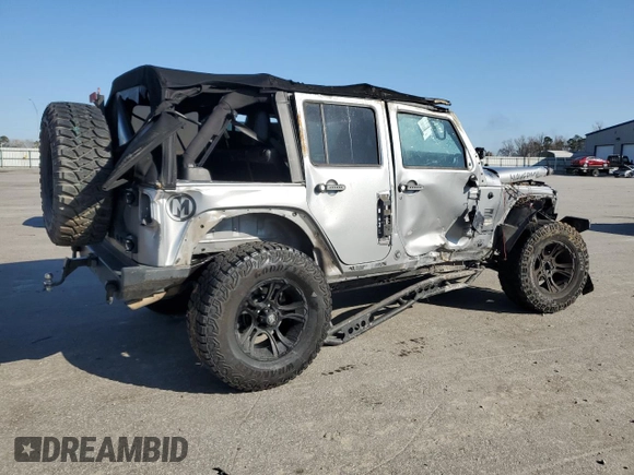 2015 Jeep Wrangler Unlimited Wrangler X with VIN 1C4BJWEG7FL580885, listed as a Copart auction lot 48891605 with 104,448 mi miles and Salvage title. Bid and sale history available at DreamBid. Image 3.