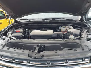 2023 Chevrolet Suburban Premier with VIN 1GNSCFKD3PR519575, listed as a IAAI auction lot 41467325 with 18,007 mi miles and . Bid and sale history available at DreamBid. Image 8.