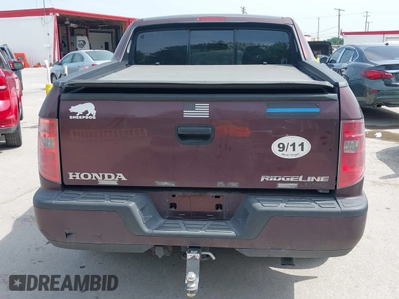 2009 Honda Ridgeline RT with VIN 5FPYK16239B109716, listed as a IAAI auction lot 42068772 with 206,649 mi miles. Bid and sale history available at carsss.com. Image 16.