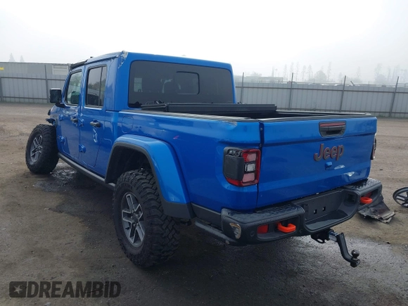 2024 Jeep Gladiator Mojave X z VIN 1C6JJTEG5RL121313, wystawiony jako IAAI lot #41013599 z przebiegiem 2 952 mil mil oraz . Historia ofert i sprzedaży dostępna na DreamBid. Obrazek 3.