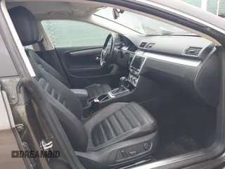 2013 Volkswagen CC R-Line z VIN WVWBN7AN5DE514951, wystawiony jako IAAI lot #42056158 z przebiegiem 108 119 mil mil oraz . Historia ofert i sprzedaży dostępna na DreamBid. Obrazek 5.