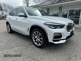 2019 BMW X5 xDrive40i with VIN 5UXCR6C56KLK99829, listed as a Copart auction lot 51001235 with 165,939 mi miles and Clean Title. Bid and sale history available at carsss.com. Image 1.