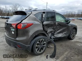 2016 Mazda CX-5 Grand Touring with VIN JM3KE4DY5G0848717, listed as a Copart auction lot 53249895 with 86,746 mi miles and Salvage Title. Bid and sale history available at carsss.com. Image 3.