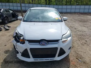 2012 Ford Focus SE with VIN 1FAHP3F2XCL122141, listed as a IAAI auction lot 42008877 with 122,743 mi miles. Bid and sale history available at carsss.com. Image 12.