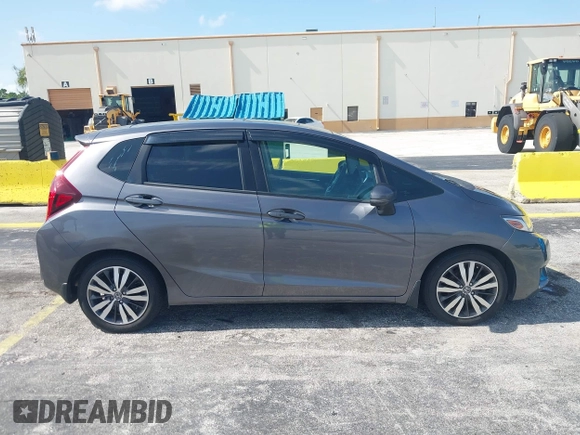 2015 Honda Fit EX-L z VIN 3HGGK5H89FM730013, wystawiony jako IAAI lot #42673309 z przebiegiem 142 660 mil mil oraz . Historia ofert i sprzedaży dostępna na DreamBid. Obrazek 13.