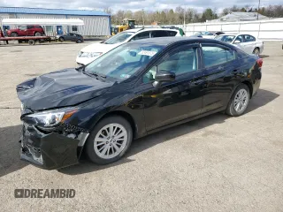 2018 Subaru Impreza Premium with VIN 4S3GKAD64J3605104, listed as a Copart auction lot 52491075 with 63,012 mi miles and Salvage title. Bid and sale history available at DreamBid. Image 1.