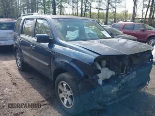 2010 Honda Pilot Touring with VIN 5FNYF4H80AB025356, listed as a IAAI auction lot 42029008 with 138,785 mi miles. Bid and sale history available at carsss.com. Image 1.