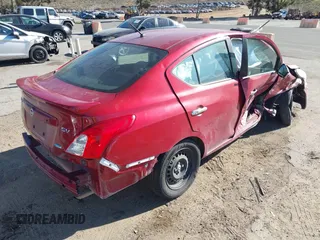 2015 Nissan Versa SV with VIN 3N1CN7APXFL906108, listed as a IAAI auction lot 41674926 with 135,613 mi miles. Bid and sale history available at carsss.com. Image 4.