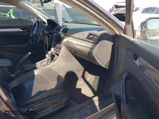 2015 Volkswagen Passat 1.8T S with VIN 1VWAS7A38FC116213, listed as a IAAI auction lot 41749385 with 169,599 mi miles. Bid and sale history available at carsss.com. Image 5.
