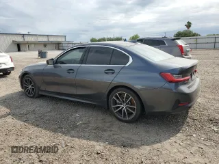 2020 BMW 3 Series 330i with VIN 3MW5R1J01L8B05802, listed as a Copart auction lot 52021825 with 86,214 mi miles and Salvage title. Bid and sale history available at DreamBid. Image 2.