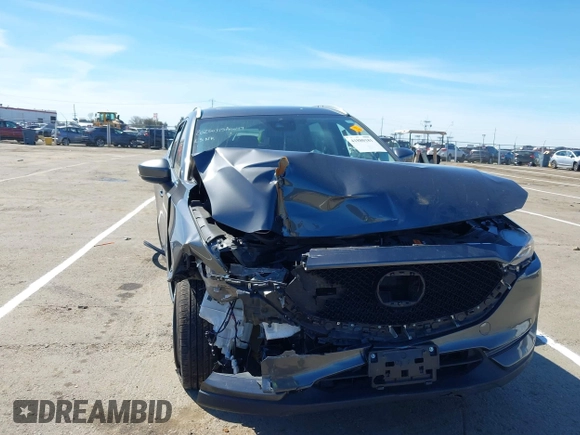 2019 Mazda CX-5 Touring with VIN JM3KFACM1K0533142, listed as a IAAI auction lot 41880181 with Not Provided miles and . Bid and sale history available at carsss.com. Image 6.