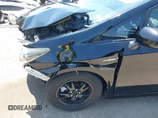 2015 Toyota Prius Four z VIN JTDKN3DU3F1914593, wystawiony jako IAAI lot #42477785 z przebiegiem 127 244 mil mil oraz . Historia ofert i sprzedaży dostępna na DreamBid. Obrazek 18.