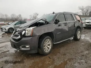 2015 GMC Yukon SLT with VIN 1GKS2BKC1FR732961, listed as a Copart auction lot 49898945 with 0 mi miles and Salvage Title. Bid and sale history available at carsss.com. Image 1.