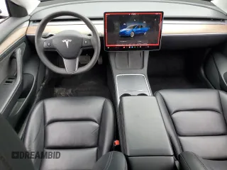 2023 Tesla Model 3 with VIN 5YJ3E1EA7PF450973, listed as a Copart auction lot 61082175 with 47,029 mi miles and Salvage title. Bid and sale history available at DreamBid. Image 8.