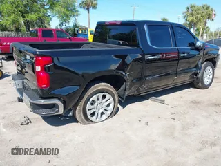 2024 Chevrolet Silverado 1500 LTZ with VIN 1GCUDGE81RZ298421, listed as a IAAI auction lot 41775039 with 6,900 mi miles and . Bid and sale history available at DreamBid. Image 4.