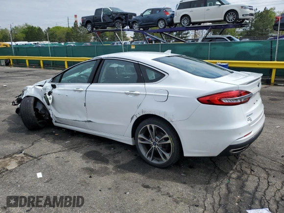 2020 Ford Fusion Titanium z VIN 3FA6P0D96LR205475, wystawiony jako Copart lot #56313075 z przebiegiem 30 888 mil mil oraz Szkoda całkowita • Salvage title. Historia ofert i sprzedaży dostępna na DreamBid. Obrazek 2.