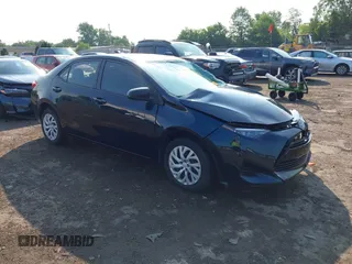 2018 Toyota Corolla L with VIN 5YFBURHE8JP761903, listed as a IAAI auction lot 42461048 with 65,330 mi miles and . Bid and sale history available at DreamBid. Image 1.
