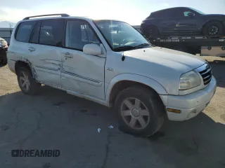 2002 Suzuki XL-7 Standard with VIN JS3TX92VX24118298, listed as a Copart auction lot 42781415 with 312,010 mi miles and Salvage Title. Bid and sale history available at carsss.com. Image 4.