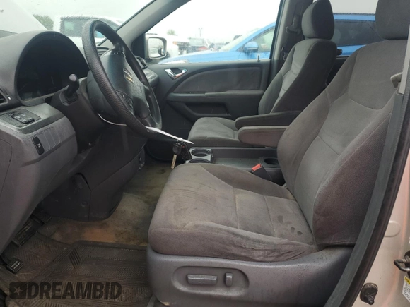 2005 Honda Odyssey EX with VIN 5FNRL38415B410659, listed as a Copart auction lot 58535455 with 198,250 mi miles and Salvage title. Bid and sale history available at DreamBid. Image 7.