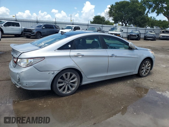 2012 Hyundai Sonata Limited z VIN 5NPEC4AB4CH455218, wystawiony jako Copart lot #60414585 z przebiegiem 195 817 mil mil oraz Szkoda całkowita • Salvage title. Historia ofert i sprzedaży dostępna na DreamBid. Obrazek 3.
