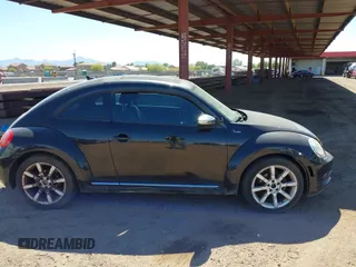 2013 Volkswagen Beetle 2.5L with VIN 3VWJP7ATXDM679115, listed as a IAAI auction lot 42212965 with Not Provided miles and . Bid and sale history available at DreamBid. Image 13.