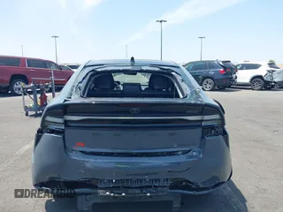 2024 Toyota Prius SE z VIN JTDACACU1R3033326, wystawiony jako IAAI lot #42174204 z przebiegiem 11 273 mil mil oraz . Historia ofert i sprzedaży dostępna na DreamBid. Obrazek 17.
