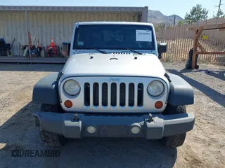 2008 Jeep Wrangler Unlimited X with VIN 1J4GA39168L592999, listed as a IAAI auction lot 42699909 with 158,128 mi miles and . Bid and sale history available at DreamBid. Image 12.