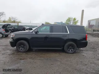 2015 Chevrolet Tahoe Commercial with VIN 1GNSK2EC8FR570602, listed as a IAAI auction lot 41977021 with 115,866 mi miles. Bid and sale history available at carsss.com. Image 14.
