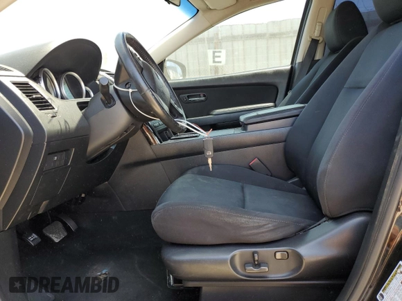 2015 Mazda CX-9 Sport z VIN JM3TB2BAXF0447315, wystawiony jako Copart lot #60842505 z przebiegiem 122 281 mil mil oraz Szkoda całkowita • Salvage title. Historia ofert i sprzedaży dostępna na DreamBid. Obrazek 7.