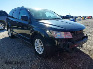 2015 Dodge Journey SXT with VIN 3C4PDCBB2FT531344, listed as a IAAI auction lot 41863170 with 168,488 mi miles. Bid and sale history available at carsss.com. Image 1.