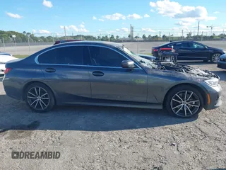2021 BMW 3 Series 330i xDrive with VIN 3MW5R7J01M8B49173, listed as a IAAI auction lot 41672538 with 82,259 mi miles and . Bid and sale history available at carsss.com. Image 13.