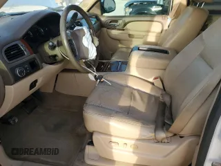 2013 Chevrolet Tahoe LTZ with VIN 1GNSCCE08DR102648, listed as a Copart auction lot 49677345 with 226,528 mi miles and Salvage title. Bid and sale history available at DreamBid. Image 7.