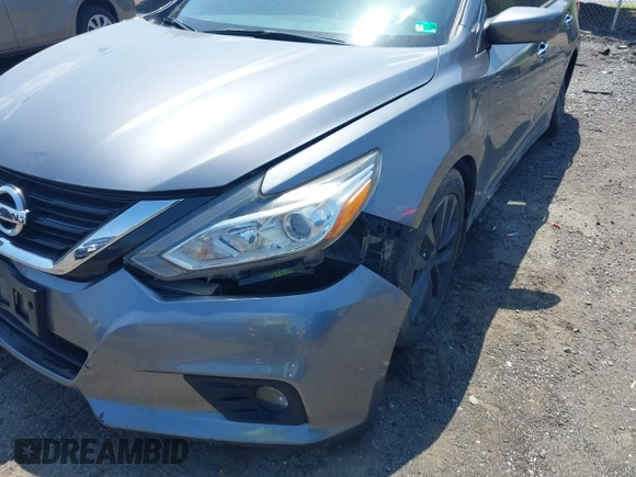 2016 Nissan Altima SR with VIN 1N4AL3AP1GC204037, listed as a IAAI auction lot 42558701 with 82,002 mi miles and . Bid and sale history available at DreamBid. Image 6.