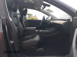2022 Tesla Model Y Long Range with VIN 7SAYGDEE8NF317482, listed as a IAAI auction lot 41806043 with 32,108 mi miles and . Bid and sale history available at carsss.com. Image 5.