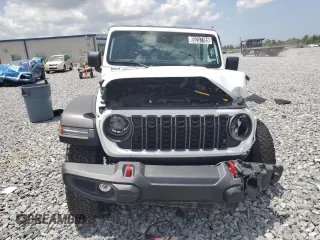 2024 Jeep Wrangler Rubicon z VIN 1C4PJXFG9RW336006, wystawiony jako Copart lot #60237785 z przebiegiem 24 571 mil mil oraz Czysty tytuł • Clean title. Historia ofert i sprzedaży dostępna na DreamBid. Obrazek 5.
