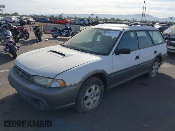 1999 Subaru Legacy Outback z VIN 4S3BG6858X7642460, wystawiony jako IAAI lot #40957251 z przebiegiem 206 546 mil mil oraz . Historia ofert i sprzedaży dostępna na DreamBid. Obrazek 2.